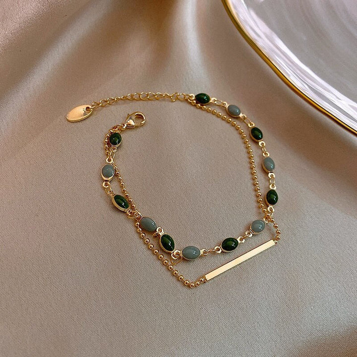 Pulsera doble con charms