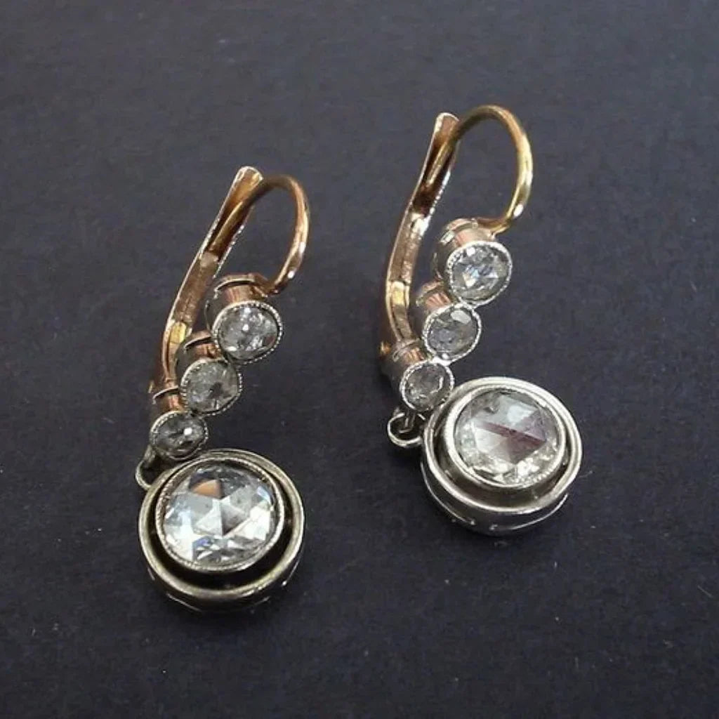 Pendientes vintage dorados con circonita