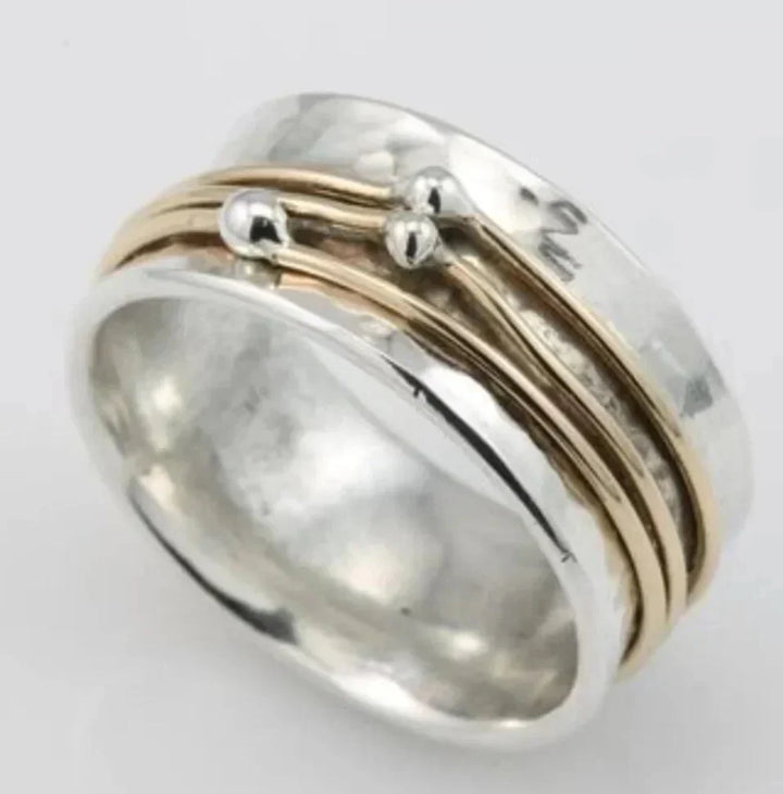 Anillo vintage dorado con capas plateadas