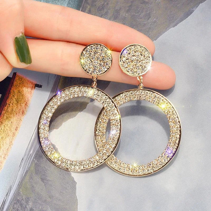 Pendientes de circonita en oro y plata