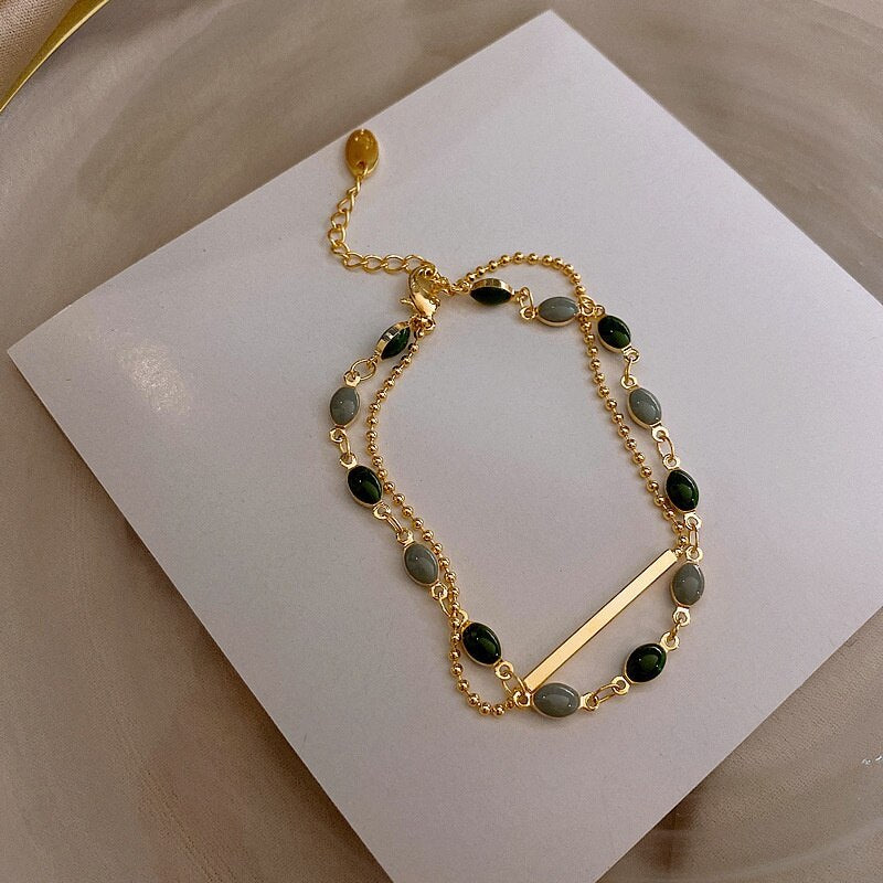 Pulsera doble con charms