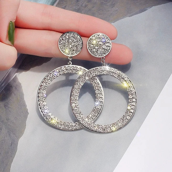 Pendientes de circonita en oro y plata