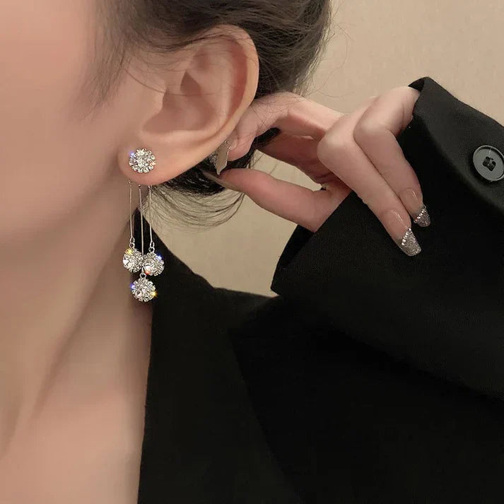 Pendientes Triade de circonita chapados en oro