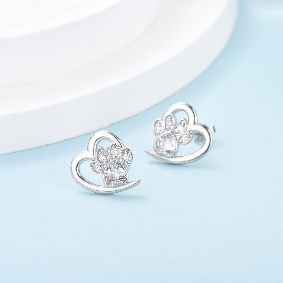 Pendientes con pata y corazón con circonita