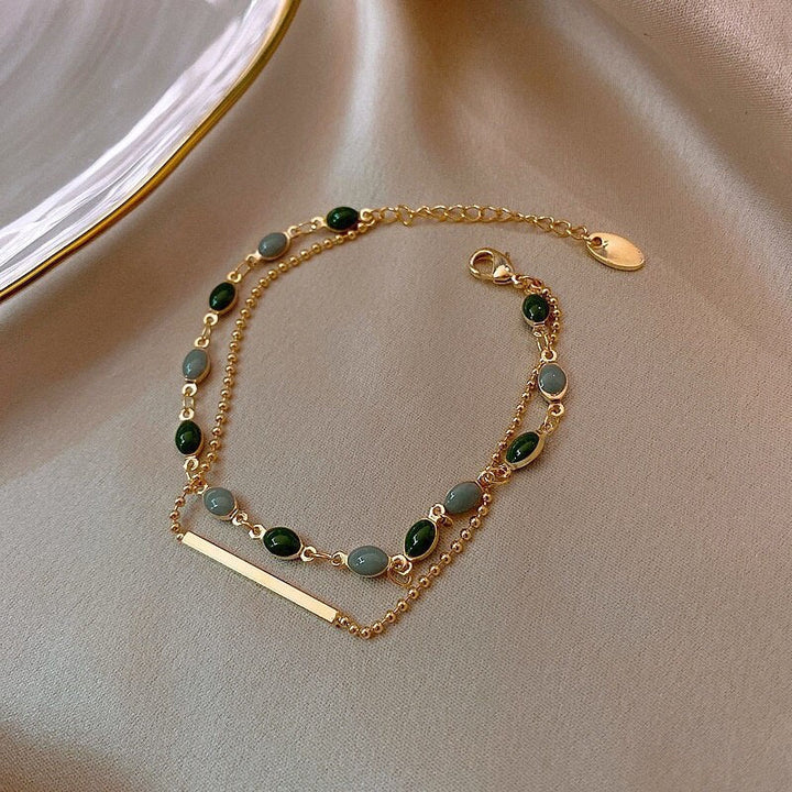 Pulsera doble con charms