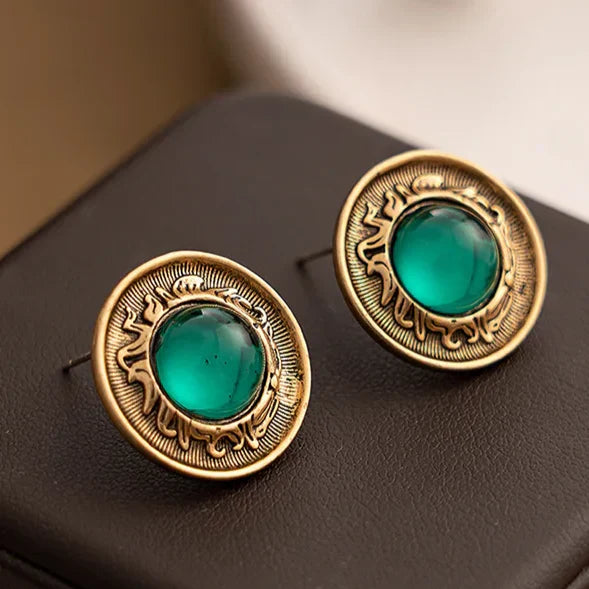 Pendientes dorados con cristal turquesa