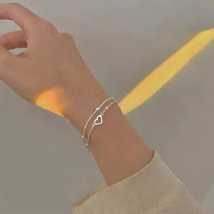 Pulsera ajustable de plata con corazón