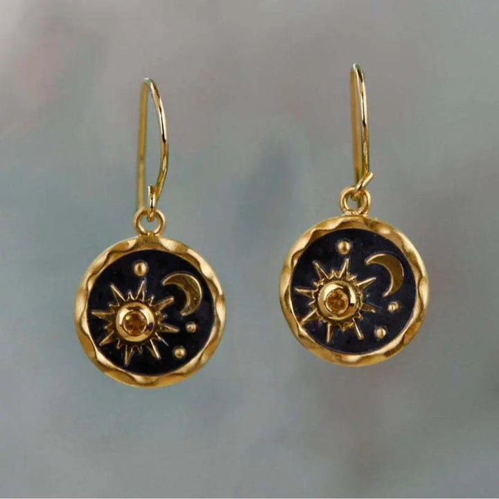 Pendientes con sol y luna en oro y plata