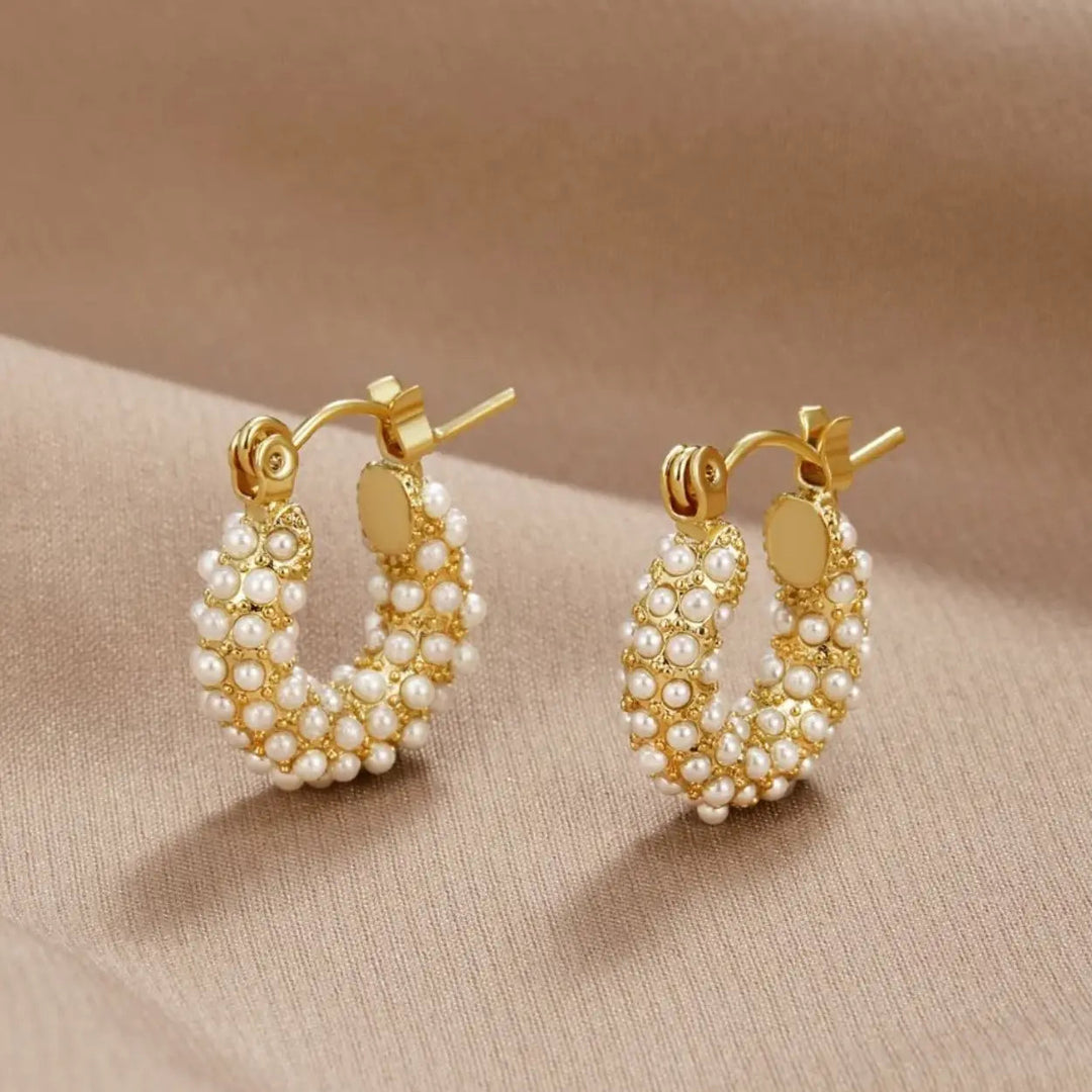 Pendientes de perlas dorados