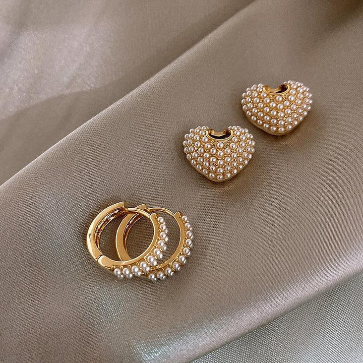 Pendientes de perlas del amor en oro