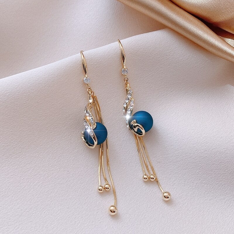 Pendientes festivos con perlas azules