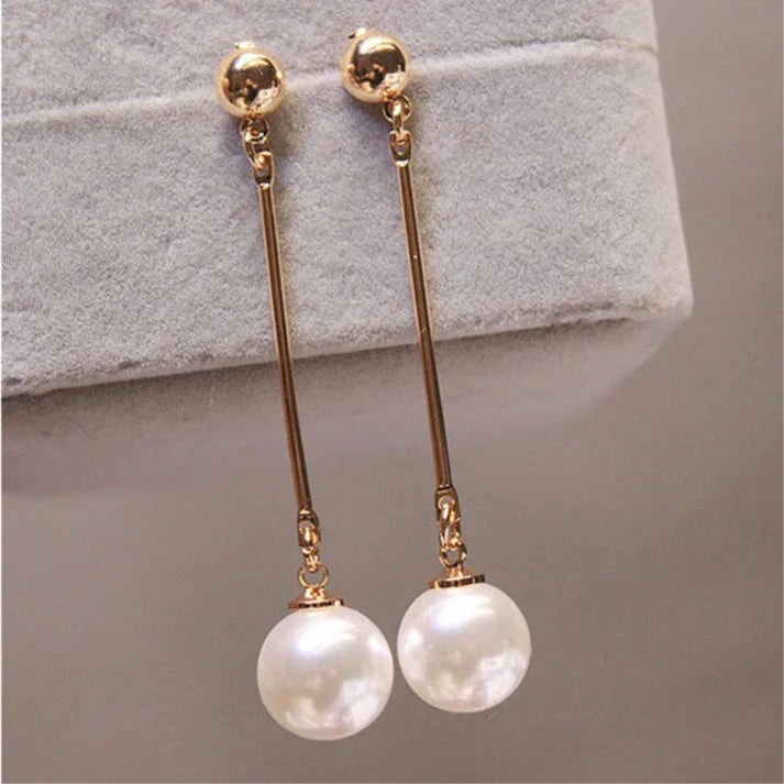 Pendientes colgantes de lujo con perlas especiales montadas a mano