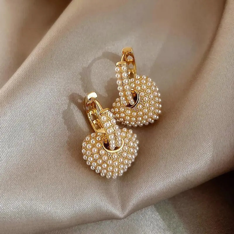 Pendientes de perlas del amor en oro