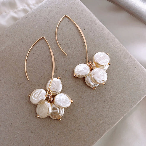 Elegantes pendientes con perla y cristal