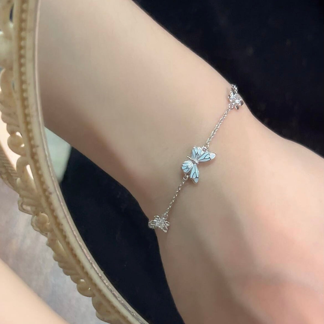 Pulsera de Plata Mariposa Azul que Brilla en la Oscuridad
