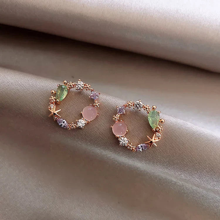 Floral con circonita en oro