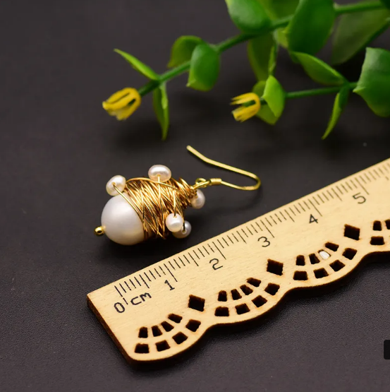 Pendientes artesanales con cuentas de arroz