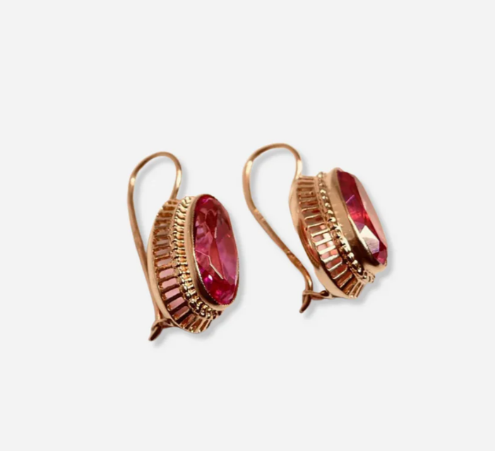 Pendientes en oro rosa con piedras rojas
