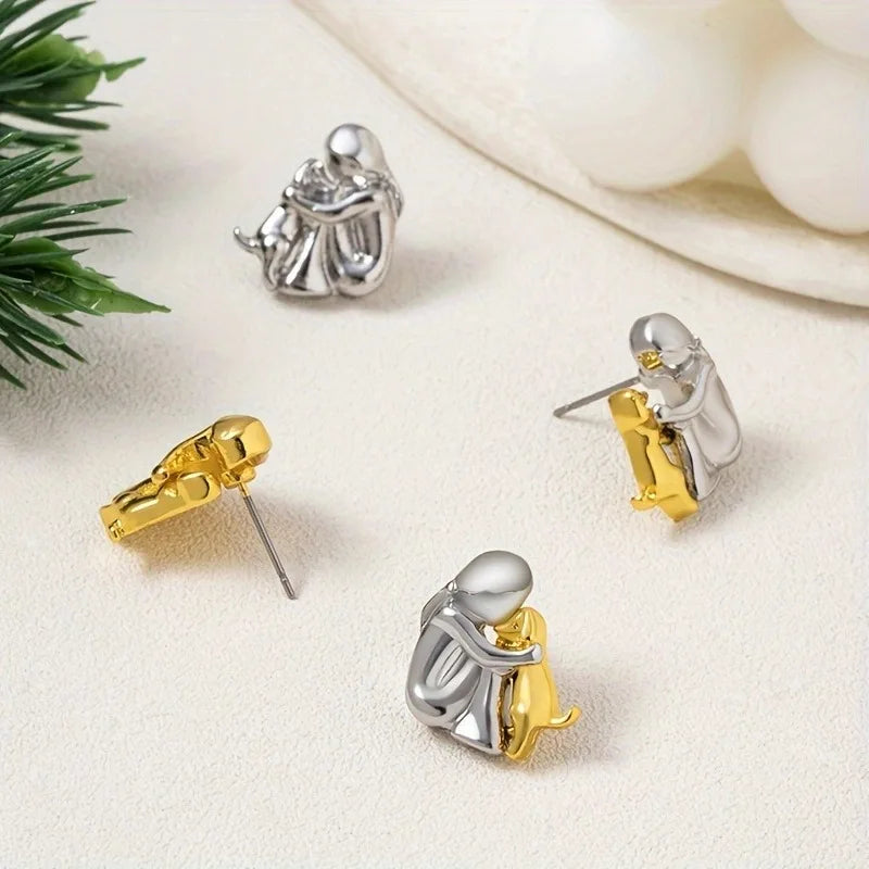 Pendientes Abrazo en dos tonos, plata y oro