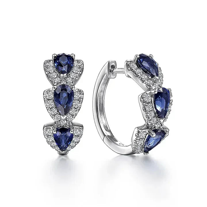 Pendientes con escudo real y piedras preciosas