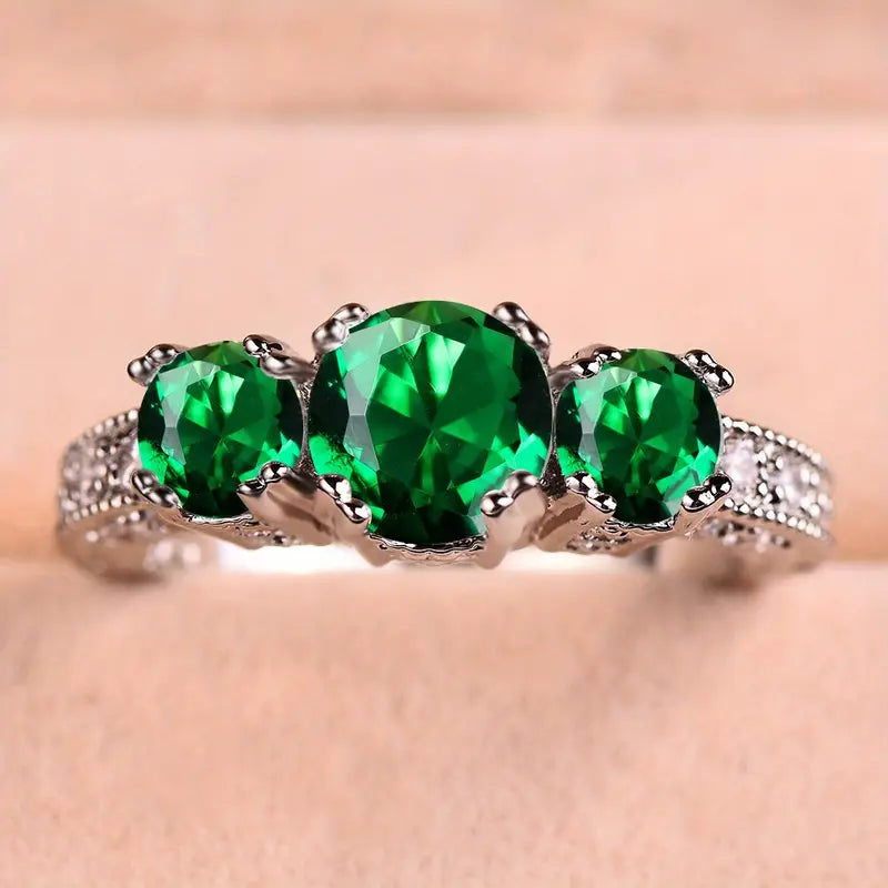 Anillo con 3 piedras de Esmeralda