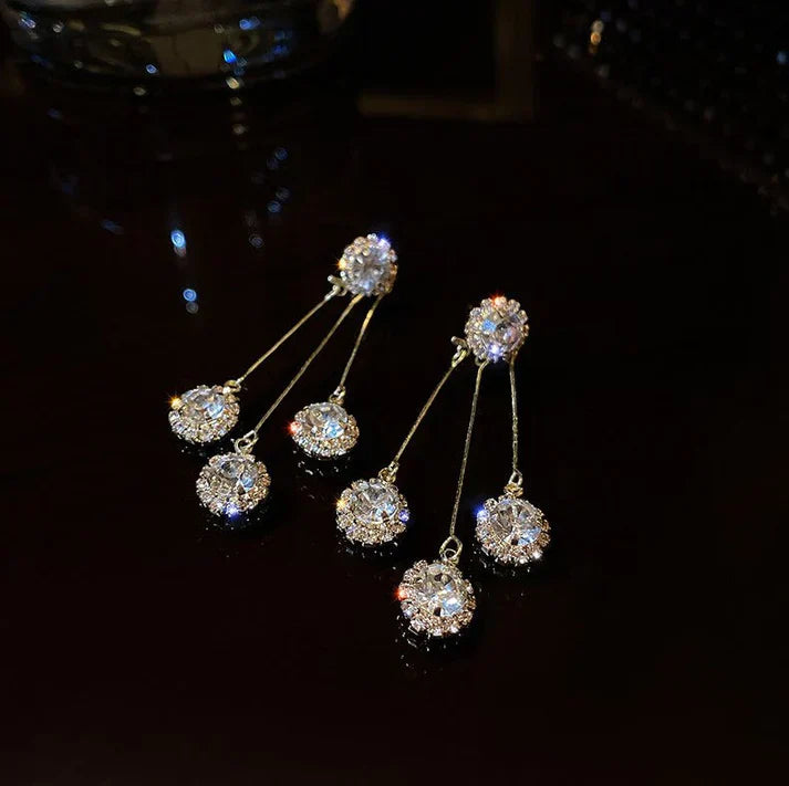 Pendientes Triade de circonita chapados en oro
