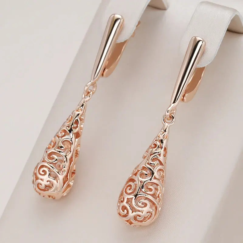 Pendientes dorados con colgante mandala