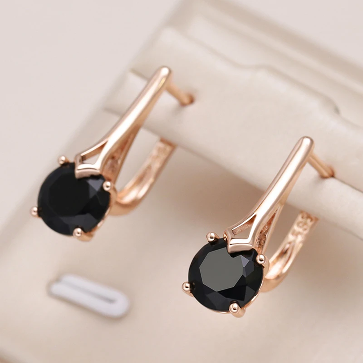 Elegantes pendientes de oro con circonita negra