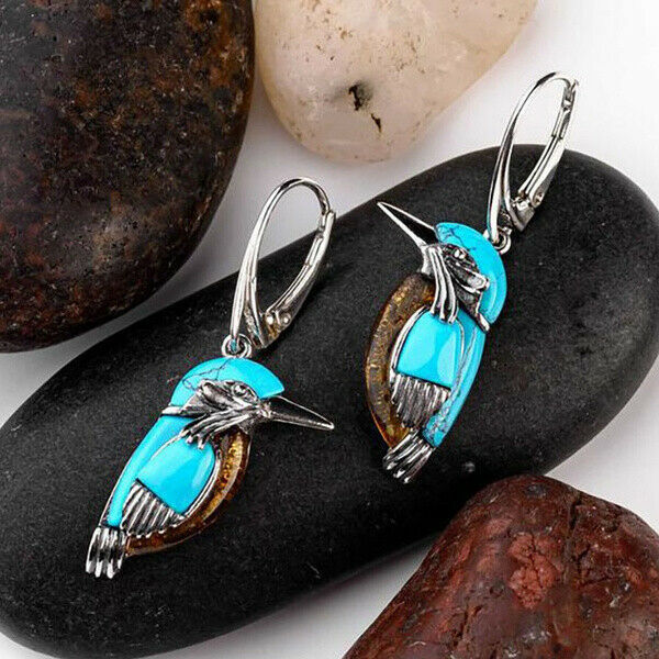 Pendientes vintage con pájaro azul