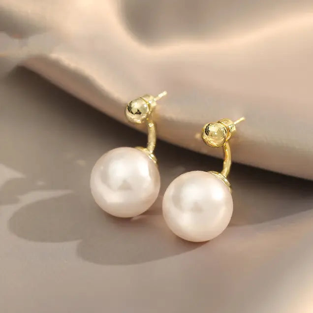 Pendientes con perlas doradas