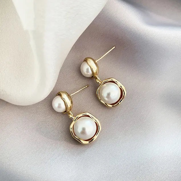 Pendientes con perlas bañados en oro