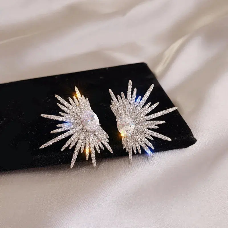 Elegantes y bonitos pendientes con brillo