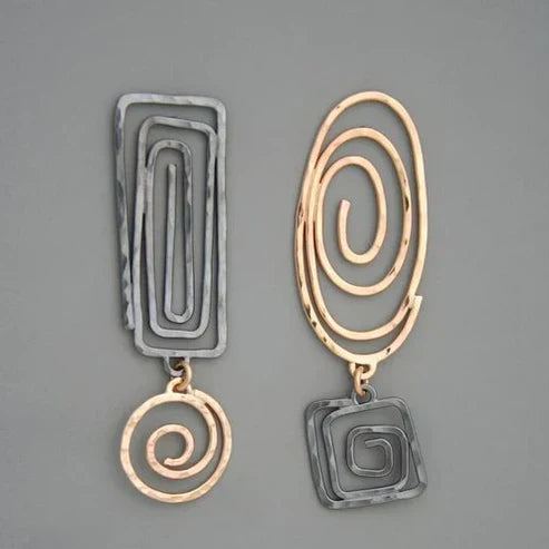 Elegantes pendientes de oro y plata