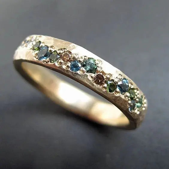 Anillo vintage dorado con capas plateadas