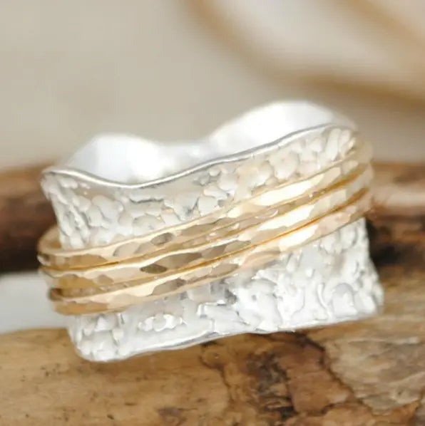 Anillo vintage fino giratorio en dorado y plateado