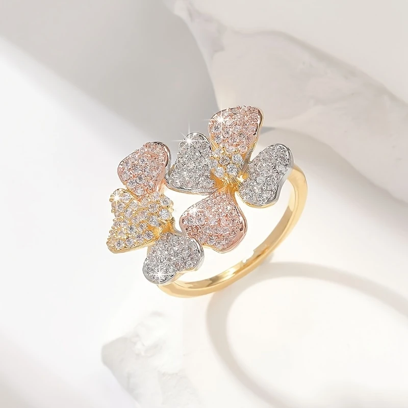 Anillo Dorado Heller con Elementos Naturales