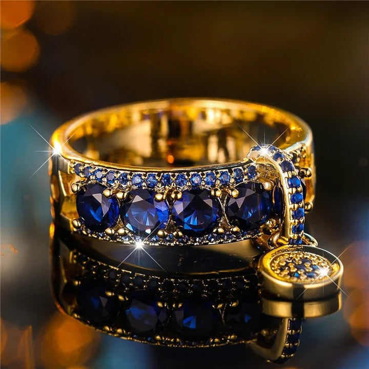 Anillo antiguo de oro y cristal azul