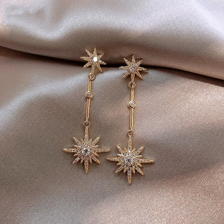 Pendientes vintage de oro con estrella de cristal