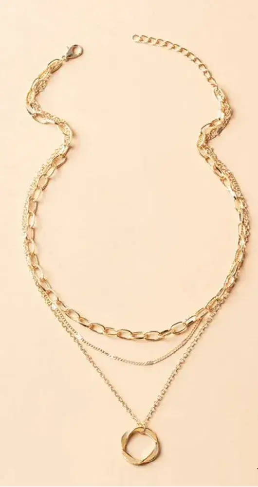 Collar vintage con cadena en capas y colgante dorado