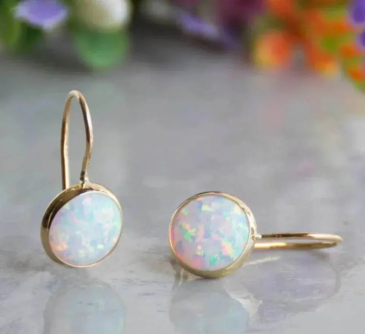 Pendientes vintage de oro con piedra de ópalo