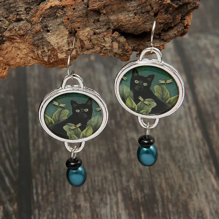 Pendientes colgantes vintage con gato negro tropical