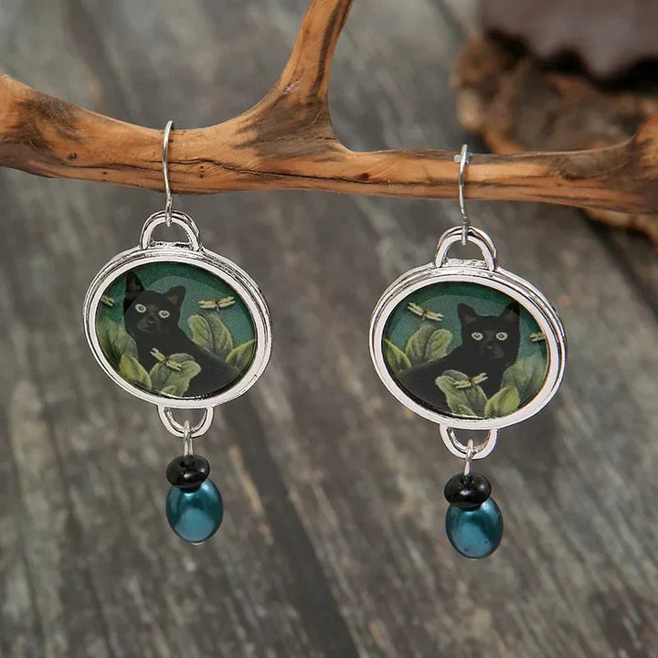Pendientes colgantes vintage con gato negro tropical