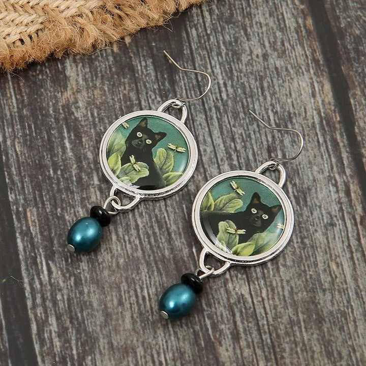 Pendientes colgantes vintage con gato negro tropical