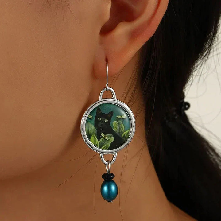 Pendientes colgantes vintage con gato negro tropical